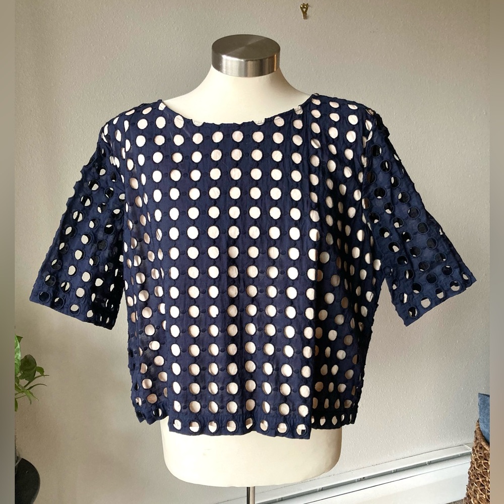 Adorable Ann Taylor navy eyelet top.